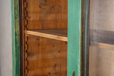 wooden dresser with glass doors