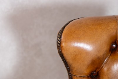 chesterfield-style-tan-armchair-close-up