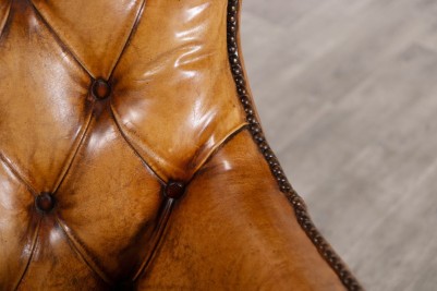 chesterfield-style-tan-armchair-close-up