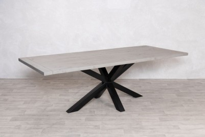 oversized-industrial-star-base-dining-table