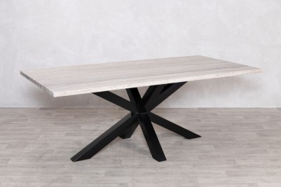 travertine-top-black-star-base-dining-table