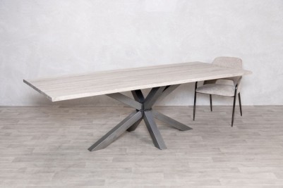 Travertine Top Gunmetal Star Base Dining Table