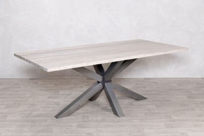 Travertine Top Gunmetal Star Base Dining Table