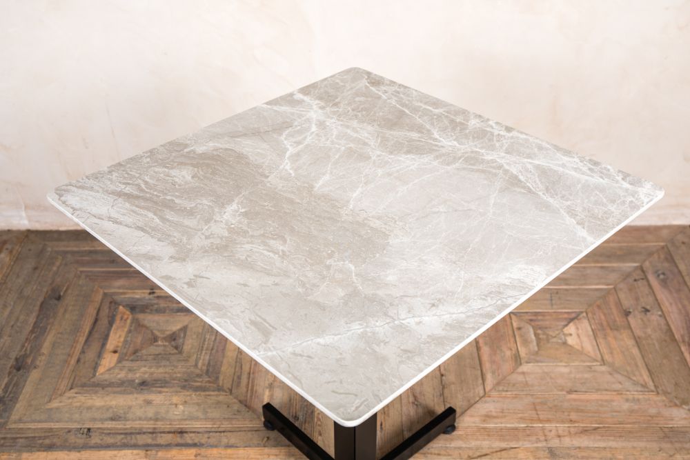 square marble effect dining table